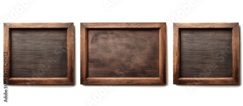 Three wooden frames arranged on a black background for a stylish and elegant display