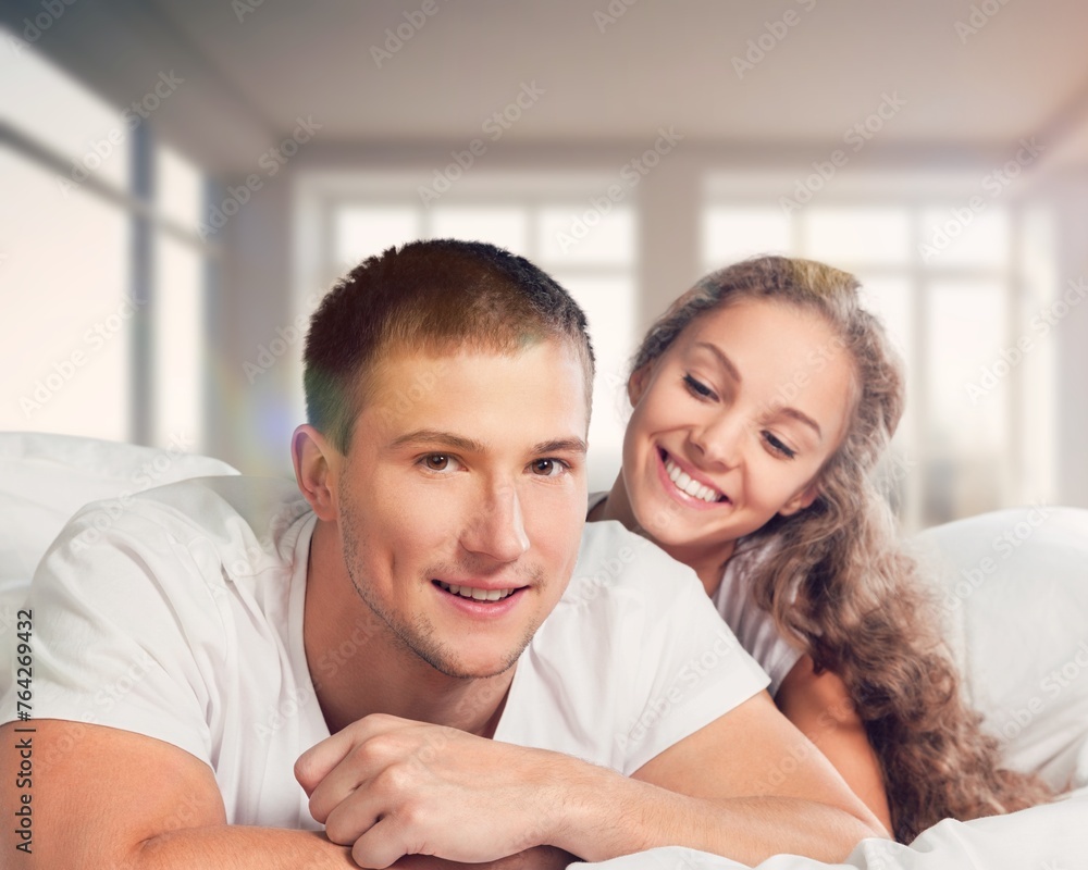 Morning, happy couple relax on bed Morning, happy couple relax on bed