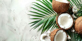 Top view of coconuts and palm leaf