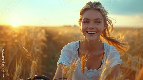 Woman Riding Bike Through Wheat Field