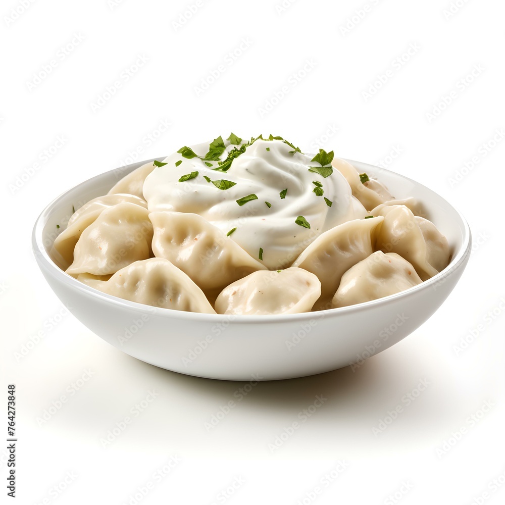 Bowl of freshly prepared dumplings topped with sour cream and parsley Bowl of freshly prepared dumplings topped with sour cream and parsley
