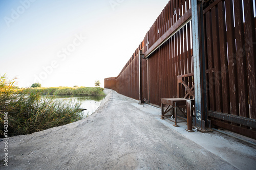 The US border wall between Yuma Arizona and Los Algodones Mexico.