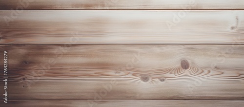 An up-close view of a wooden wall featuring a rich brown stain, giving it a weathered and rustic appearance