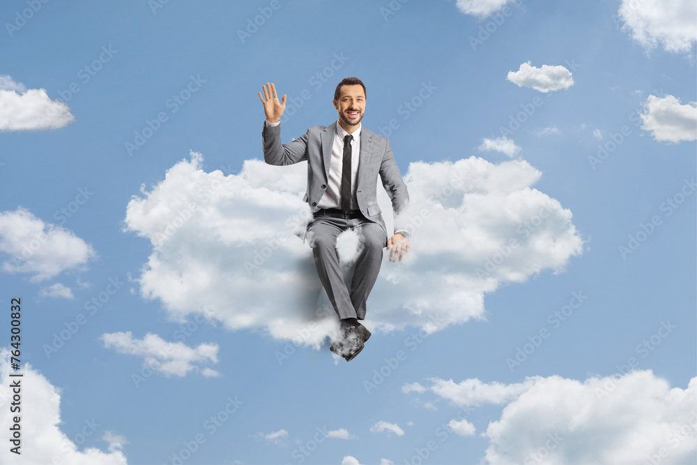 Businessman floating on a cloud Businessman floating on a cloud