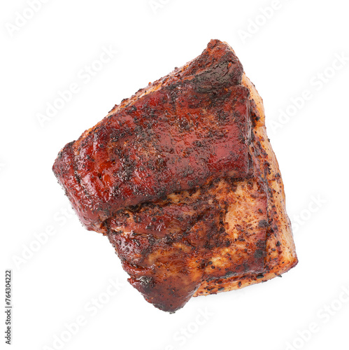 Piece of tasty baked pork belly isolated on white  top view