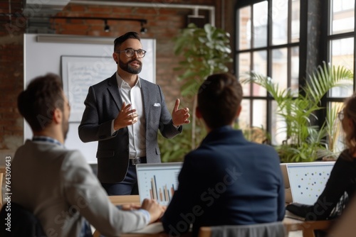 A man stands at a podium, delivering a presentation to a diverse group of attentive individuals, Leader addressing a business team during a brainstorming session, AI Generated photo