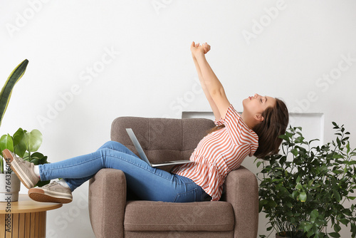 Female freelancer with lapt...
