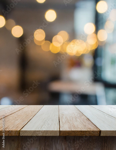 empty wooden table and blurred bokeh lights cafe background  mock up for display of product  montage your products 