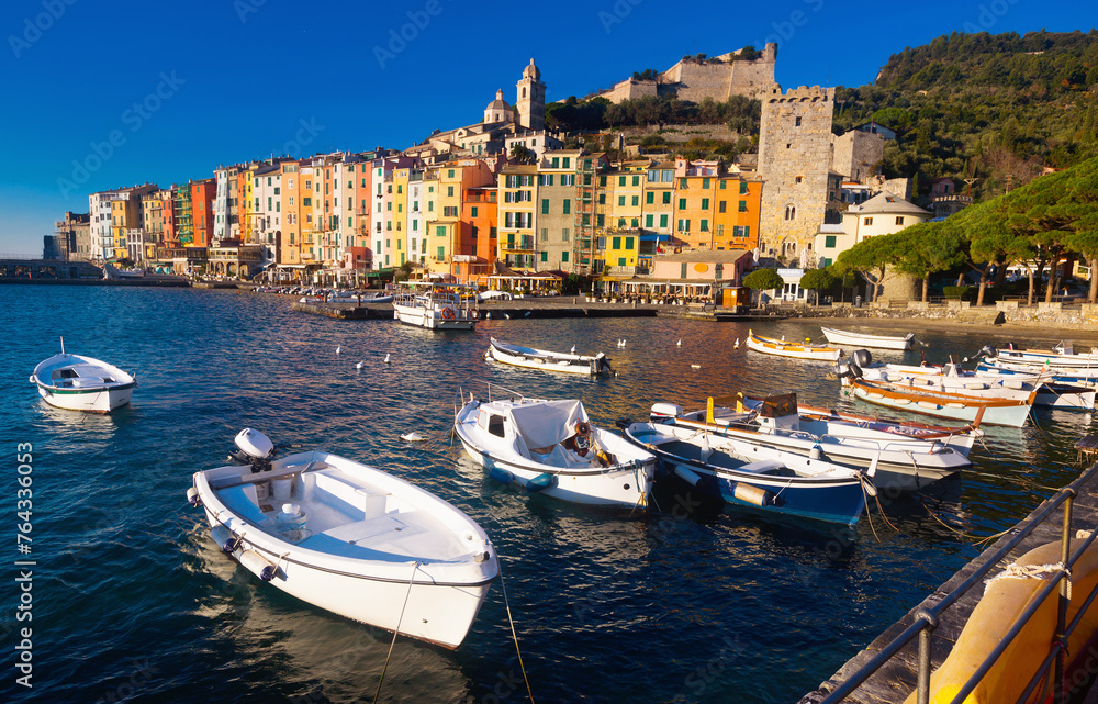 Landscape of picturesque Italian town of Portovenere with fortress walls on Ligurian seaside.