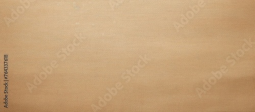A detailed view capturing the texture of brown paper illuminated by a gentle light