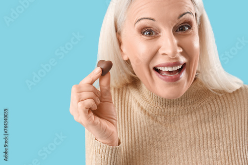Mature woman with heart-sha...
