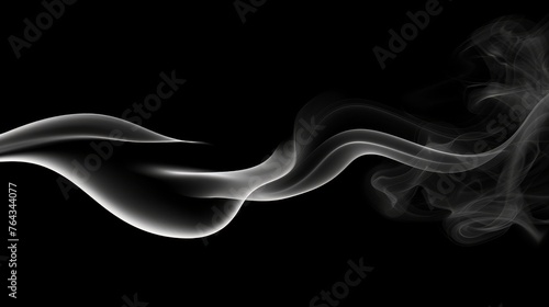 a black and white photo of smoke on a black background with a long tail of smoke coming out of the top of the tail. photo