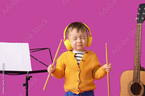 Cute little composer with d...