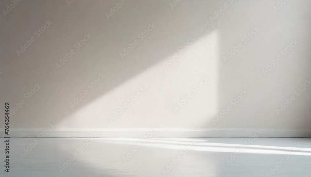 Minimalistic abstract light grey wall background for product presentation with sunlight shadow. Minimalistic abstract light grey wall background for product presentation with sunlight shadow.