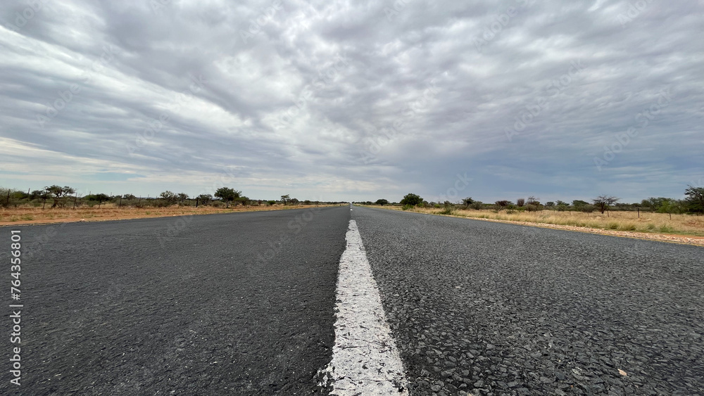 Road with clouds in Namibia