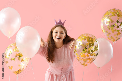 Young woman in crown with b...