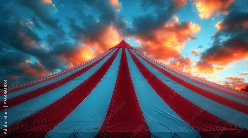 Dramatic sunset over circus tent Dramatic sunset over circus tent
