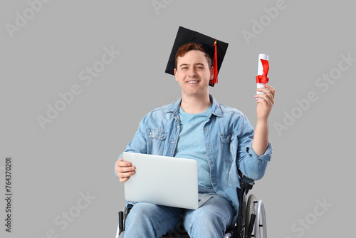 Male graduate in wheelchair...