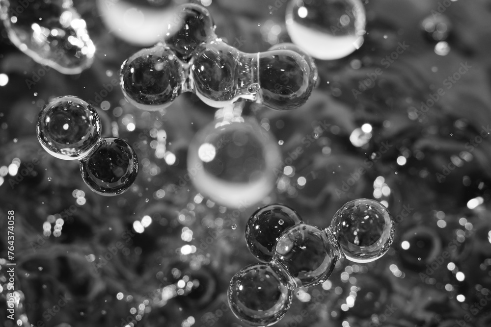 Macro shot of drop pearl bubbles on water Macro shot of drop pearl bubbles on water