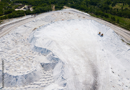 View from drone of unusual White Mountain in Podmoskovye, Russia - large open air slagheap of Lopatinsky phosphate mine photo