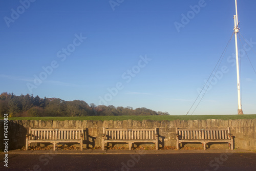 Three benches in park. High quality photo