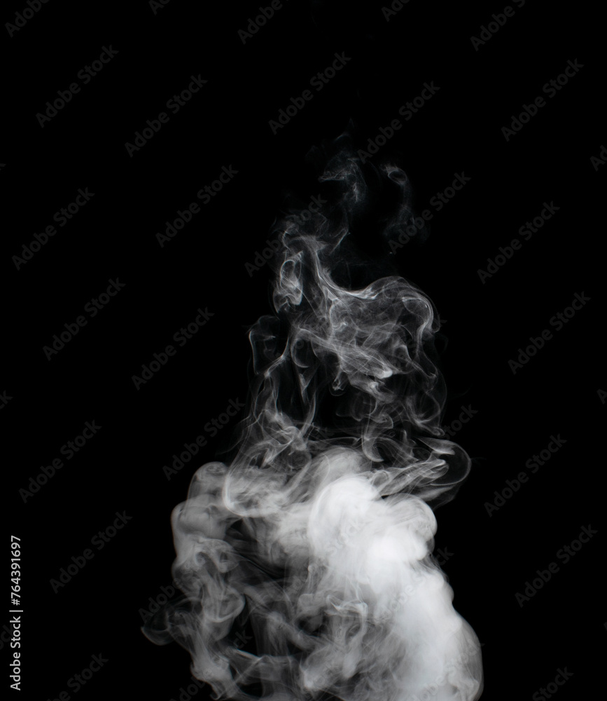 White puffs of smoke on a black background float mixing in bizarre chaotic patterns of thin threads White puffs of smoke on a black background float mixing in bizarre chaotic patterns of thin threads
