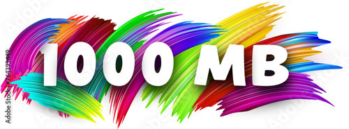 1000 MB paper word sign with colorful spectrum paint brush strokes over white.