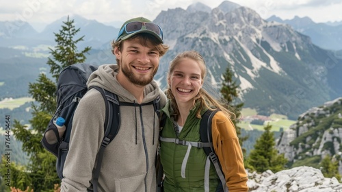 Smiling young couple on a hiking trip in the mountains- herzogstand- bavaria- germany
