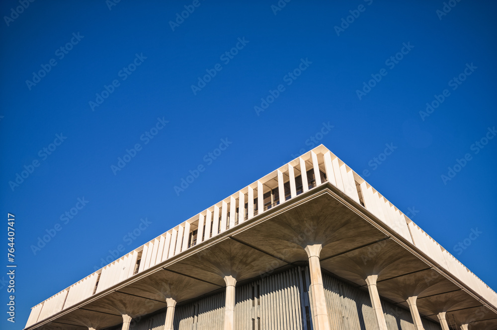 Square Building Roofline Underneath Blue Sky. Square Building Roofline Underneath Blue Sky.
