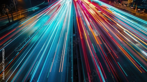 A bustling highway illuminated by streaks of car lights at night