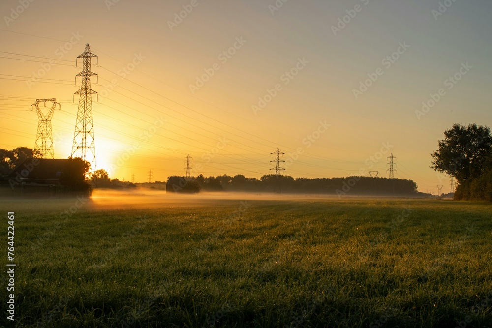 oil refinery at sunset