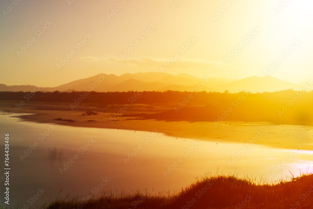 Landscape evening view golden sunset over the river with beautiful seen and background. Beauty and nature concept. Coffs Harbour’s, Australia.	
