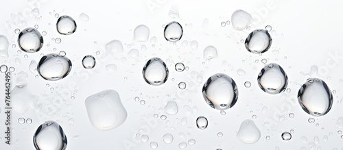 Wallpaper Mural A detailed view of numerous water droplets collected on a plain white surface Torontodigital.ca