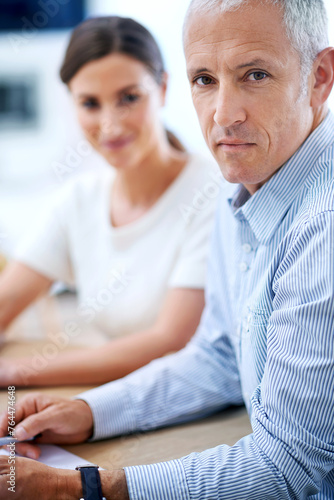 Portrait, businessman and woman at desk for meeting with project, growth and startup development in office. Planning, confidence and business people with collaboration, partnership and b2b networking