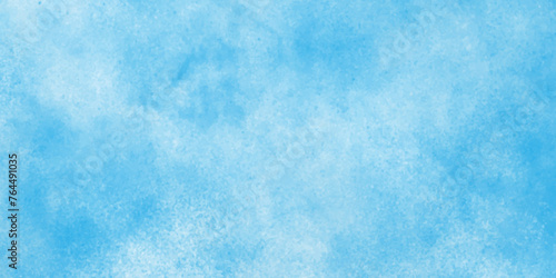 Abstract beautiful light blue cloudy sky clouds with stains, Creative vintage light sky blue background with various clouds and fogg, Watercolor stain with hand paint pattern on blue canvas. photo