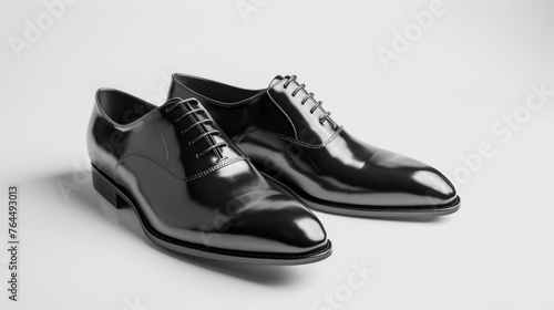 pair of classic black leather Oxford dress shoes, elegantly crafted and polished to perfection, against a pristine white background. 