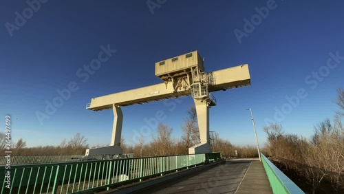 Crane industrial on hydro plant sunny wide, Mosonmagyarovar, Hungary photo