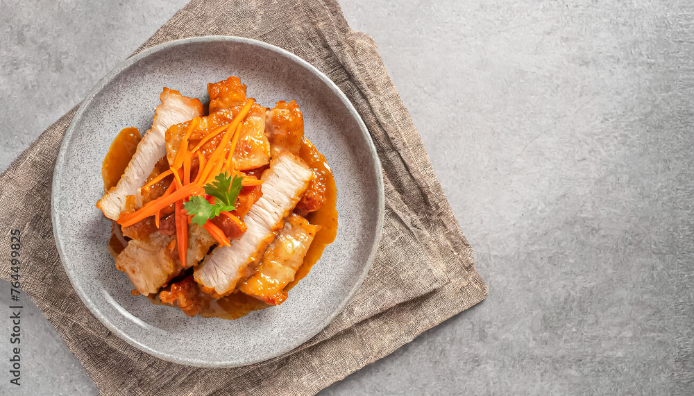 sweet and sour pork, stir fry dish. top view of stir fry crispy pork in sweet and sour sauce, pork dish, copy space sweet and sour pork, stir fry dish. top view of stir fry crispy pork in sweet and sour sauce, pork dish, copy space