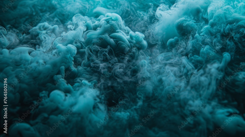 A large amount of blue-green smoke emanates from the center of the image, giving it a smoky appearance A large amount of blue-green smoke emanates from the center of the image, giving it a smoky appearance