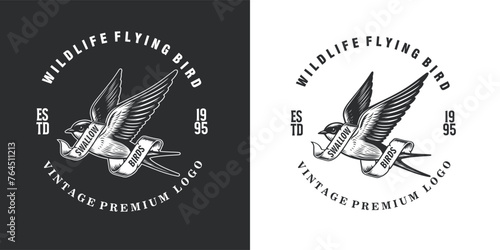 swallow bird with ribbon hand drawn vintage logo vector graphic illustration