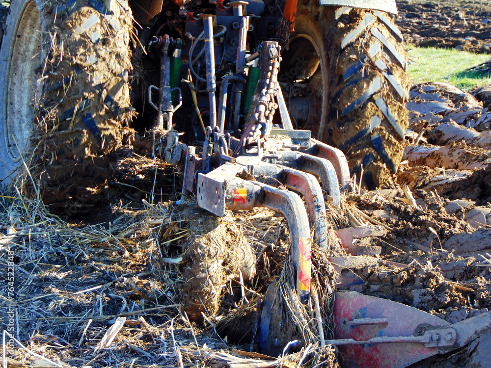 Obraz premium Tractor on the field in Romania