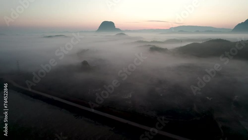  Landscape of Morning Mist with Mountain Layer at Meuang Feuang photo