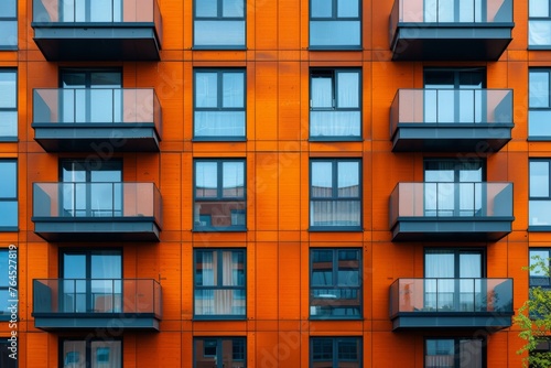 Vibrant Orange Modern Apartment Building Facade
