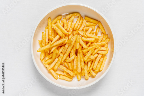 golden french fries on the white