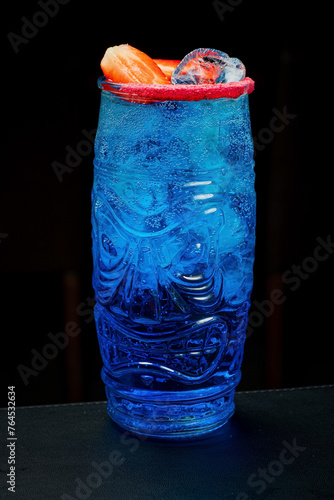blue cocktail on the dark background