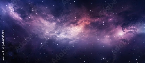 A stunning and vibrant nebula filling the space background with its colorful gases and celestial beauty photo