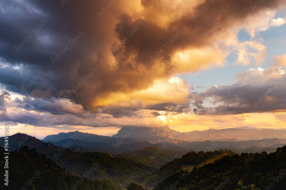 landscape and sky background concept with woman travel, nature of north Thailand, fog-laden valleys, wintery mountain passes of Chiang Mai province,  top view on the mountain sunrise and sunset.