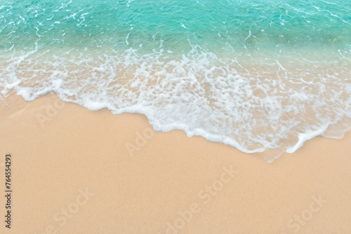 Tranquil Summer Beach Scene, Serene Wave on Deserted Sandy Shore with Ample Copy Space.