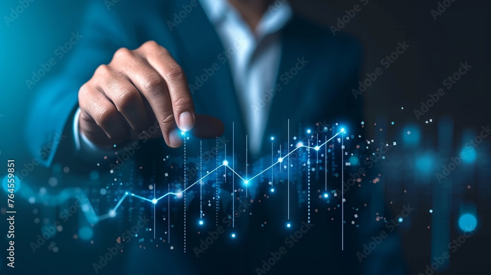 Businessman Trader's Finger Pointing at Financial Graph