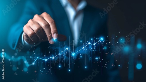 Businessman Trader's Finger Pointing at Financial Graph